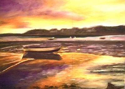Boats at low tide evening golden sunset